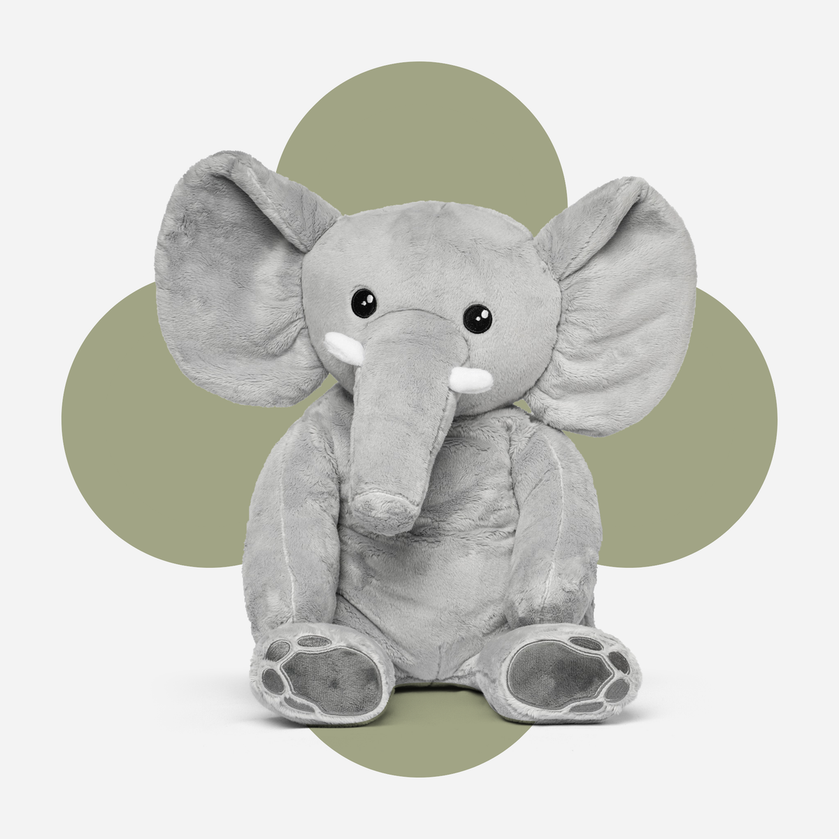 Hugsback weighted plush elephant with a flower-shaped background