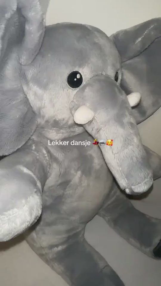Video van de grijze verzwaringsknuffel olifant die een dansje doet