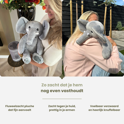 Kvinde holder den bløde tyngdebamse elefant, indendørs og udendørs